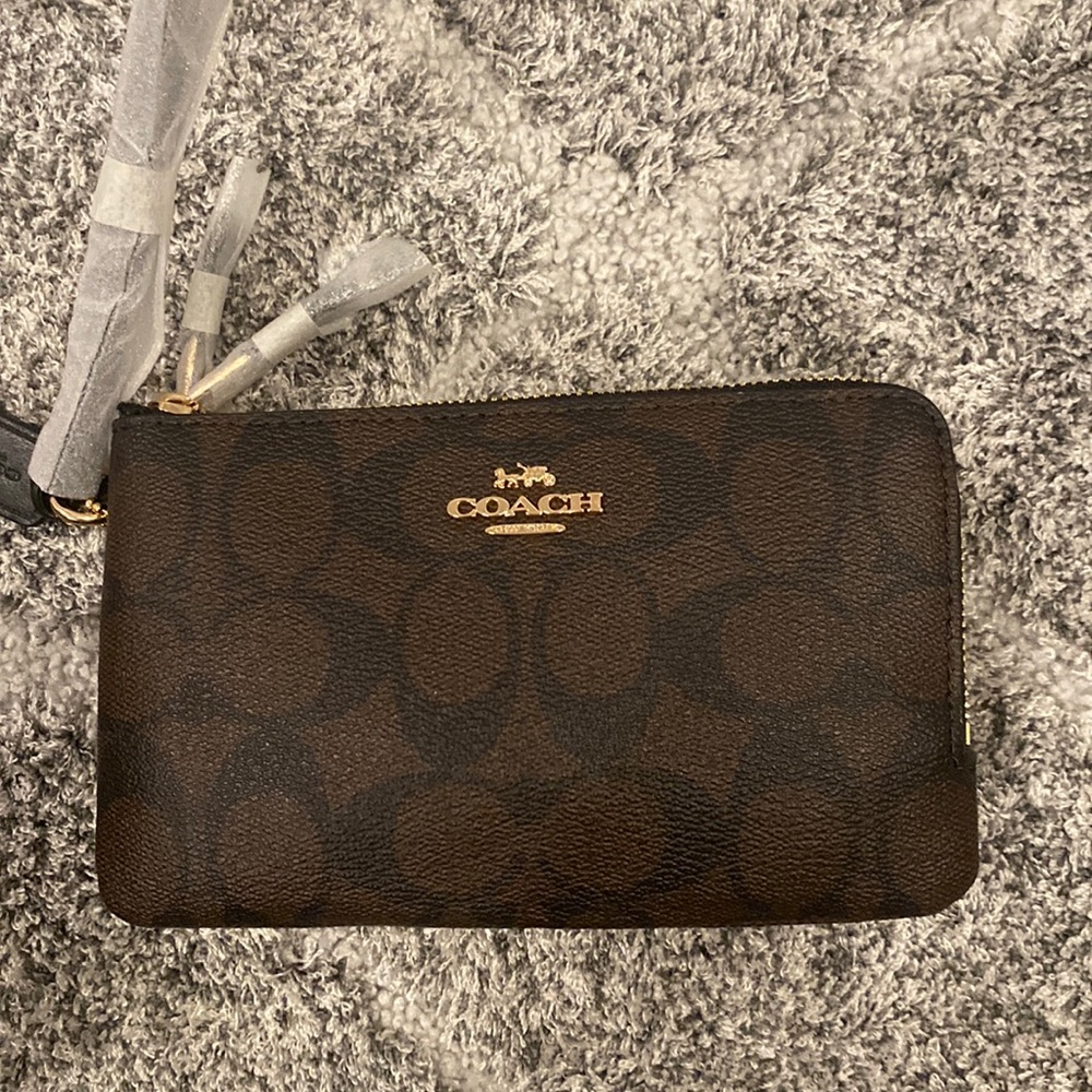 Coach double corner wristlet.